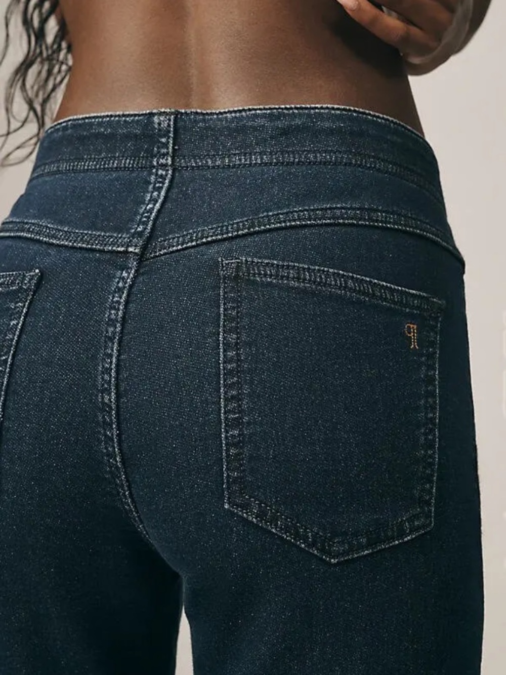 Anthropologie Pilcro Essential Low-Rise Pull-On Knit Flare Jeans in Dark Denim - Picture 4 of 5